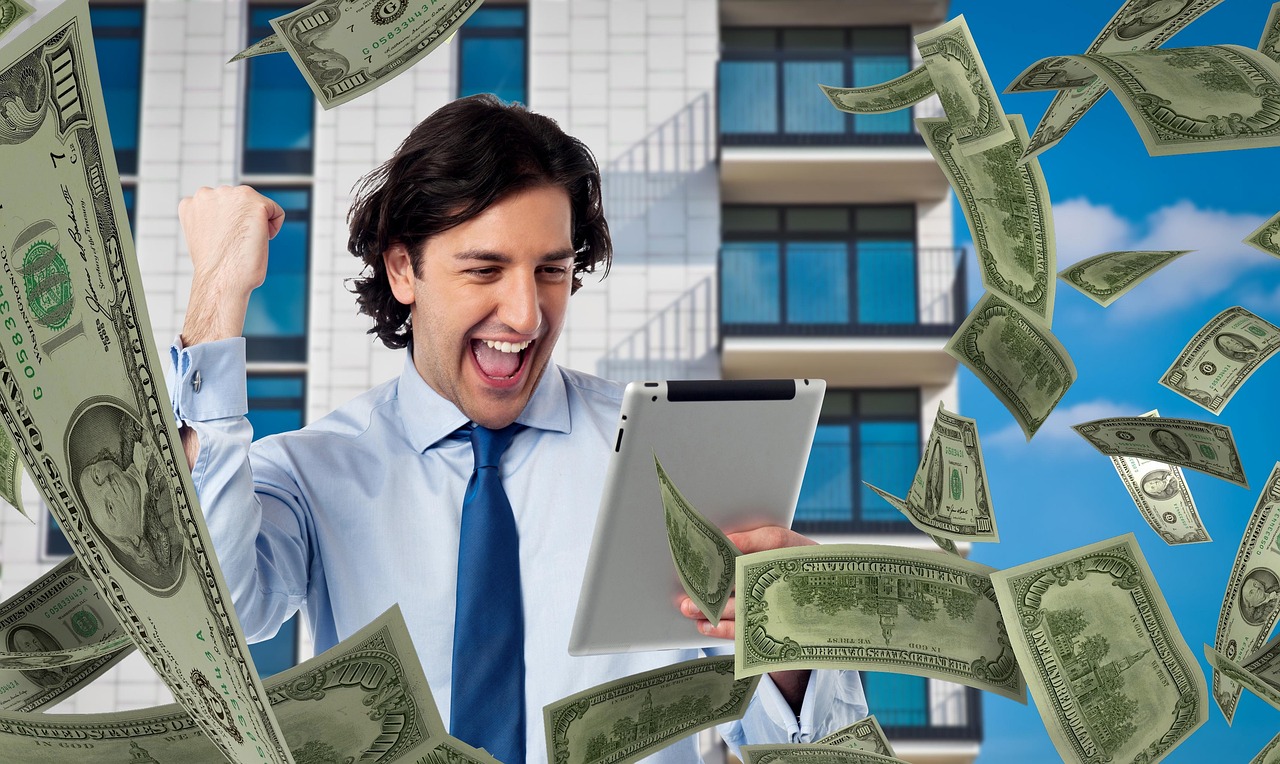 Man, money, tablet — Can Longshots Improve Your odds of Winning the Lottery? Winning the Lottery is about Longshot